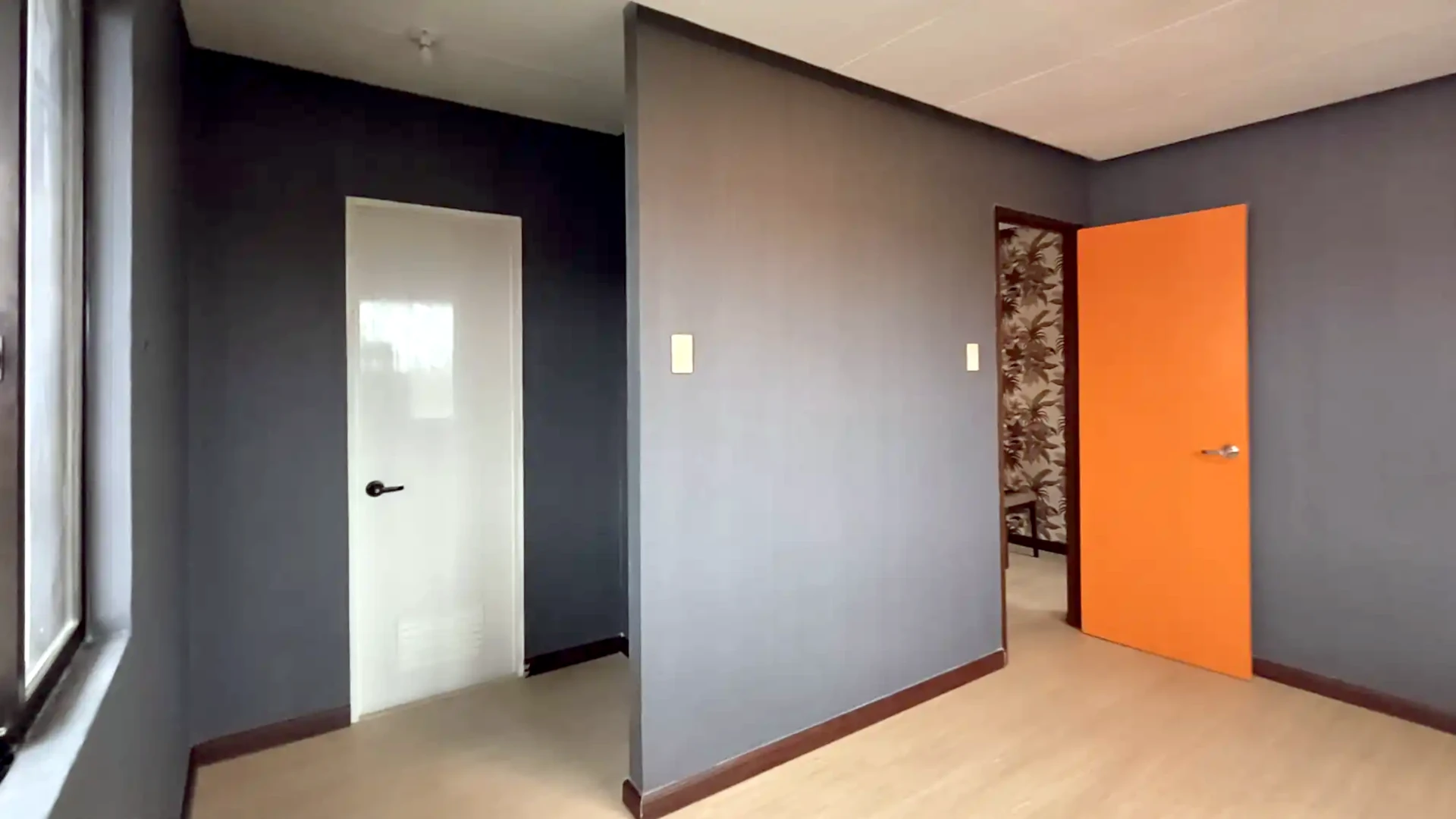 Master's Bedroom (facing bathroom and door)